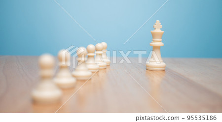 Chess King standing to Be around of other chess, Concept of a leader must have courage and challenge in the competition, leadership and business vision for a win in business games Chess King standing to Be around of other chess, Concept of a leader must have courage and challenge in the competition, leadership and business vision for a win in business games 95535186