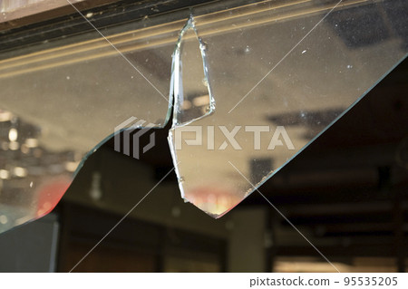 Broken window glass 95535205