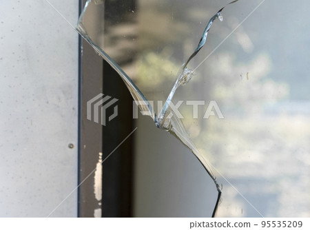 Broken window glass 95535209