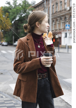 beautiful girl with baguettes and coffee beautiful girl with baguettes and coffee 95535719