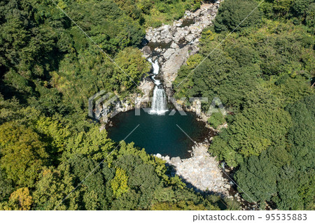 Cheonjeyeon Waterfall in Jeju Island, South Korea 95535883