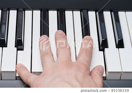 Hand play on piano Hand play on piano 95536339