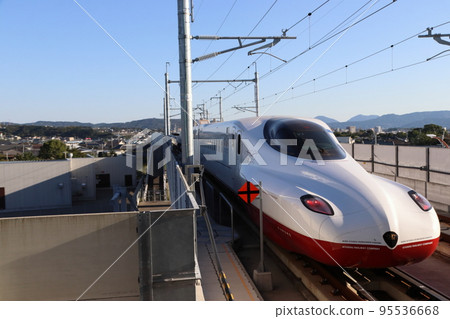 West Kyushu Shinkansen N700S series departing from Shin-Omura Station West Kyushu Shinkansen N700S series departing from Shin-Omura Station 95536668