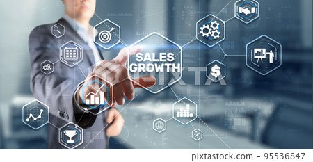 Sales Growth Man clicks inscription on virtual 3D screen Sales Growth Man clicks inscription on virtual 3D screen 95536847