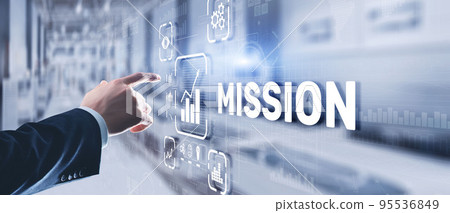 Businessman clicks on virtual screen Mission 95536849
