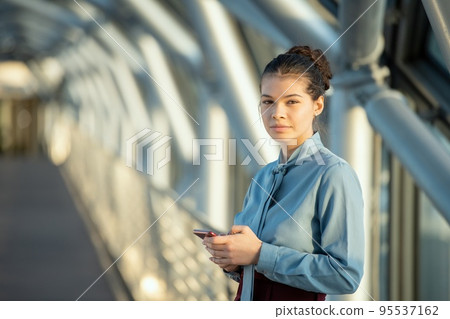 Photo realistic digital collage of young brunette female delegate 95537162