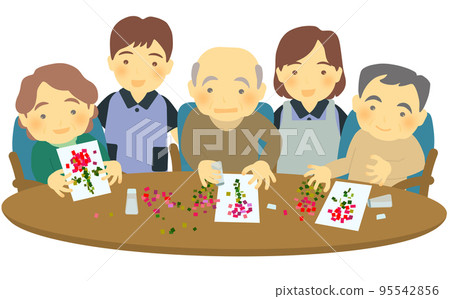 A caregiver and a user enjoying tear paintings at a facility for the elderly 95542856