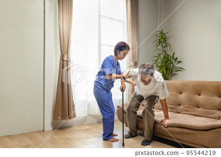Caregiver takecare older man that having Sarcopenia or muscle loss. Sarcopenia is a degenerative disease of the muscle usually caused by the natural consequence of aging. 95544219