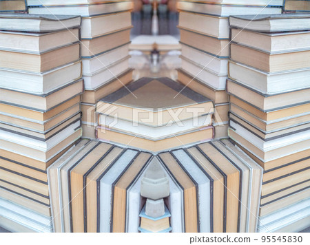 Abstract mirrored background Stack of books near the Fisherman's Wharf in San Francisco, California Abstract mirrored background Stack of books near the Fisherman's Wharf in San Francisco, California 95545830