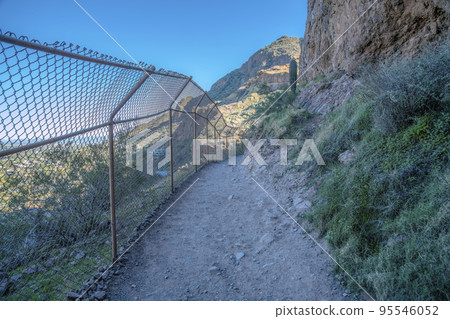 Camelback Mountain, Phoenix, Arizona- Hiking trail with chainlink fence 95546052
