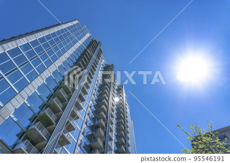 Austin, Texas- Low angle view of a high-rise condominium building against the sunny sky 95546191