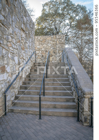 Concrete outdoor staircase for tourists in San Antonio River Walk in Texas Concrete outdoor staircase for tourists in San Antonio River Walk in Texas 95546366