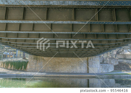 Underside of a bridge that runs over the canal in San Antonio River Walk Texas Underside of a bridge that runs over the canal in San Antonio River Walk Texas 95546416