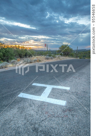 Helipad landing with a painted H mark at Sabino Canyon State Park in Tucson, AZ Helipad landing with a painted H mark at Sabino Canyon State Park in Tucson, AZ 95546658