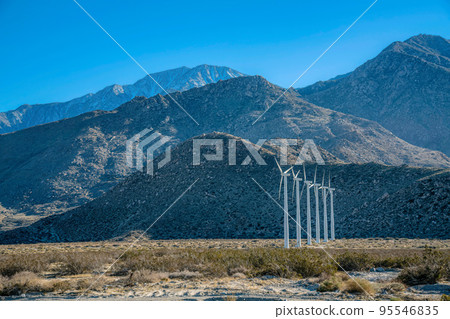 Palm Springs, California- Wind turbines on a desert at the mountainside Palm Springs, California- Wind turbines on a desert at the mountainside 95546835