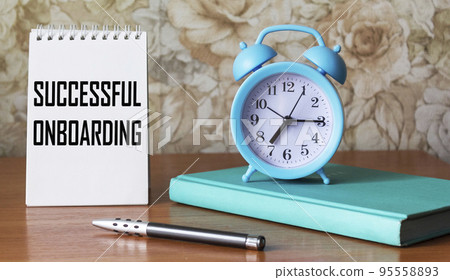 A symbol of successful adaptation. On the notebook the text Successful adaptation. A symbol of successful adaptation. On the notebook the text Successful adaptation. 95558893