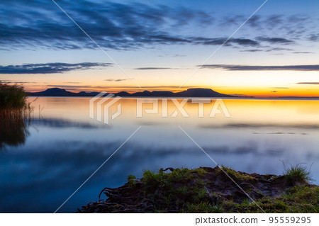 Beautiful sunrise over Lake Balaton from Hungary Beautiful sunrise over Lake Balaton from Hungary 95559295