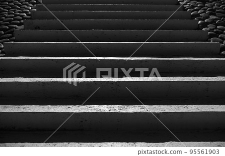 Dark concrete stairs with deep shadows, front view 95561903