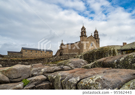 Basilica Virxe da Barca, Virgen de la Barca in Muxia, Death Coast, La Coruna, Galicia, Spain Basilica Virxe da Barca, Virgen de la Barca in Muxia, Death Coast, La Coruna, Galicia, Spain 95562443