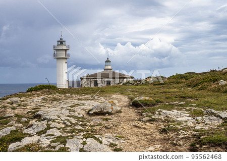 Lighthouse of cape of Tourinan in Muxia, Costa da Morte, Death Coast, Galicia, Spain. 95562468