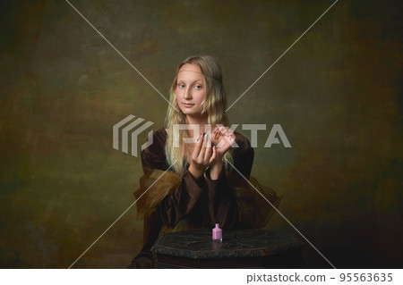 Beauty day. Portrait of young girl as Mona Lisa picture posing over dark vintage background. Retro style, art, fashion, comparison of eras concept. Beauty day. Portrait of young girl as Mona Lisa picture posing over dark vintage background. Retro style, art, fashion, comparison of eras concept. 95563635