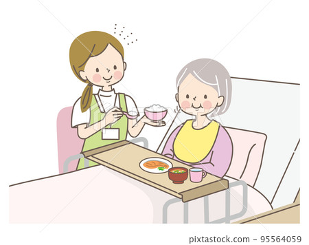 幫助一位資深婦女吃飯的看護人 95564059