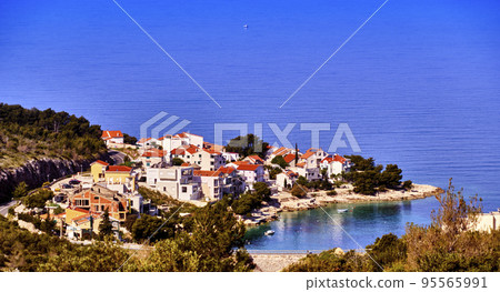 Croatian village on a peninsula near Primosten on the Mediterranean Sea Croatian village on a peninsula near Primosten on the Mediterranean Sea 95565991