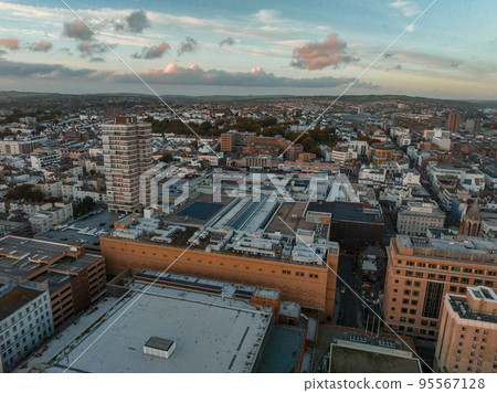 Beautiful Brighton beach view. Magical sunset and stormy weather in Brighton, UK. Town by the ocean in England. Beautiful Brighton beach view. Magical sunset and stormy weather in Brighton, UK. Town by the ocean in England. 95567128