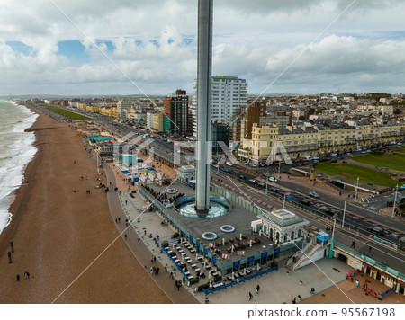 Aerial view of British Airways i360 observation deck in Brighton, UK. Beautiful tower with tourists exploring Brighton by the sea with an amazing view. Aerial view of British Airways i360 observation deck in Brighton, UK. Beautiful tower with tourists exploring Brighton by the sea with an amazing view. 95567198