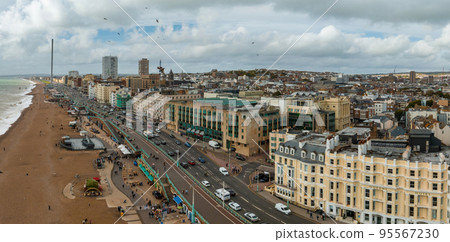 Beautiful Brighton beach view. Magical sunset and stormy weather in Brighton, UK. Town by the ocean in England. Beautiful Brighton beach view. Magical sunset and stormy weather in Brighton, UK. Town by the ocean in England. 95567230