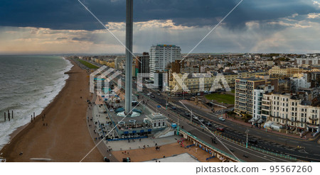 Aerial view of British Airways i360 observation deck in Brighton, UK. Beautiful tower with tourists exploring Brighton by the sea with an amazing view. Aerial view of British Airways i360 observation deck in Brighton, UK. Beautiful tower with tourists exploring Brighton by the sea with an amazing view. 95567260