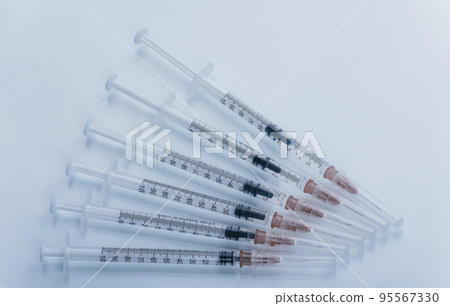 Medicine, Injection, vaccine and disposable syringe isolated, drug concept. Sterile vial medical. Macro close up on backgrounds gray. Medicine, Injection, vaccine and disposable syringe isolated, drug concept. Sterile vial medical. Macro close up on backgrounds gray. 95567330