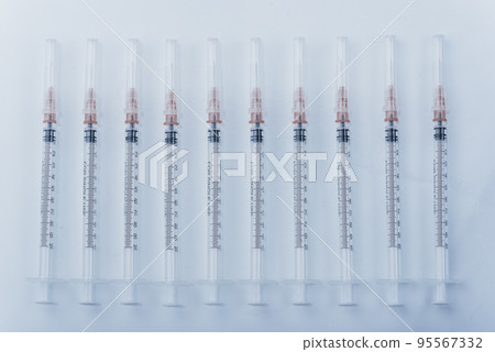Medicine, Injection, vaccine and disposable syringe isolated, drug concept. Sterile vial medical. Macro close up on backgrounds gray. 95567332