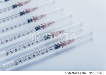 Medicine, Injection, vaccine and disposable syringe isolated, drug concept. Sterile vial medical. Macro close up on backgrounds gray. Medicine, Injection, vaccine and disposable syringe isolated, drug concept. Sterile vial medical. Macro close up on backgrounds gray. 95567469