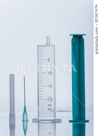 Medicine, Injection, vaccine and disposable syringe isolated, drug concept. Sterile vial medical. Macro close up on backgrounds gray. 95567474