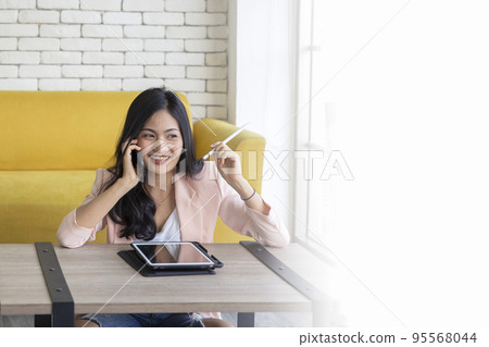 Startup successful entrepreneur small business woman online using laptop receive order from customer at her home office , online shopping marketing and stay at home concept 95568044