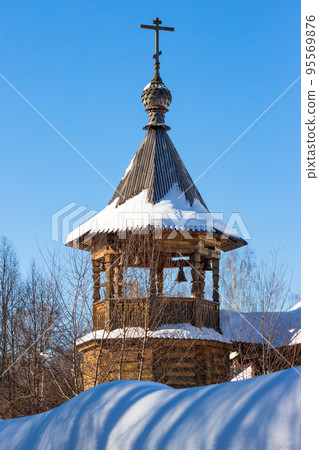 Wooden bell tower in the traditional style of the Russian Orthodox Church Wooden bell tower in the traditional style of the Russian Orthodox Church 95569876