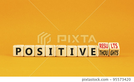 Positive results thought symbol. Concept words Positive results or Positive thoughts on cubes. Beautiful orange table orange background. Business positive results and thoughts concept. Copy space 95573420