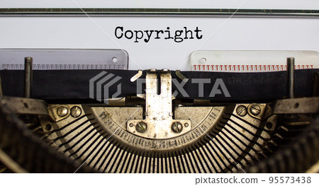 Copyright symbol. The word 'Copyright' typed on retro typewriter. Business, copyright concept. Beautiful background. 95573438