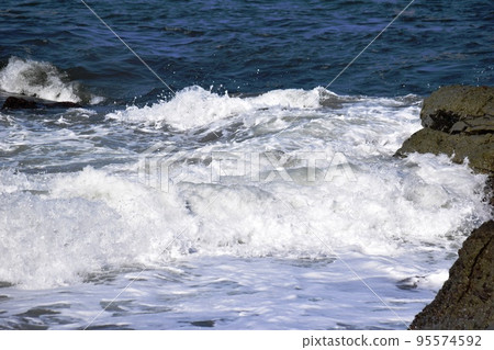 Rough waves of rocky place Shonai, Yamagata Prefecture Sea of Japan 95574592