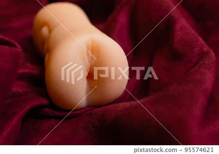 Close-up of male sex toy, realistic vagina masturbator. 95574621