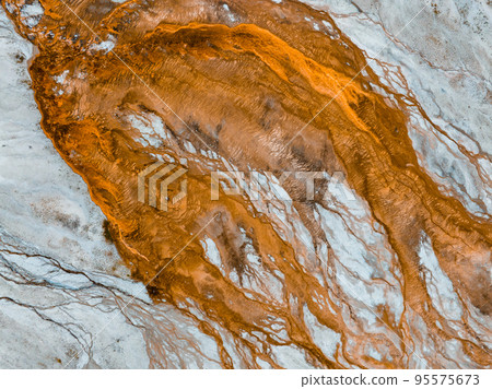 Beautiful geysers with hot water and steam with pools of thermophilic bacteria in the Upper Geyser Basin of Yellowstone National Park, Wyoming, United States. Beautiful geysers with hot water and steam with pools of thermophilic bacteria in the Upper Geyser Basin of Yellowstone National Park, Wyoming, United States. 95575673