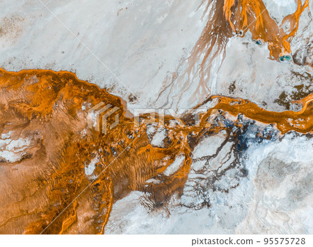Beautiful geysers with hot water and steam with pools of thermophilic bacteria in the Upper Geyser Basin of Yellowstone National Park, Wyoming, United States. Beautiful geysers with hot water and steam with pools of thermophilic bacteria in the Upper Geyser Basin of Yellowstone National Park, Wyoming, United States. 95575728
