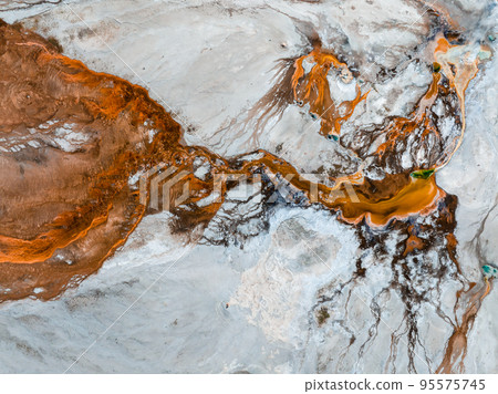 Beautiful geysers with hot water and steam with pools of thermophilic bacteria in the Upper Geyser Basin of Yellowstone National Park, Wyoming, United States. Beautiful geysers with hot water and steam with pools of thermophilic bacteria in the Upper Geyser Basin of Yellowstone National Park, Wyoming, United States. 95575745