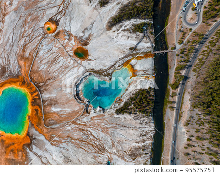 Aerial view of Grand Prismatic Spring in Midway Geyser Basin, Yellowstone National Park, Wyoming, USA. It is the largest hot spring in the United States 95575751