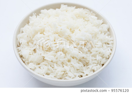 bowl of rice on white background. 95576120