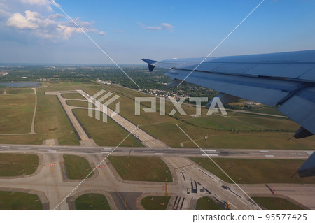 DTW Detroit Wayne County Airport runway in MI, USA. August 24, 2022 DTW Detroit Wayne County Airport runway in MI, USA. August 24, 2022 95577425