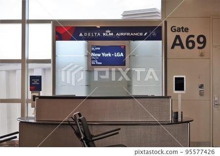 Departure gate of Delta flight from Detroit to New York in MI, USA. August 24, 2022 Departure gate of Delta flight from Detroit to New York in MI, USA. August 24, 2022 95577426