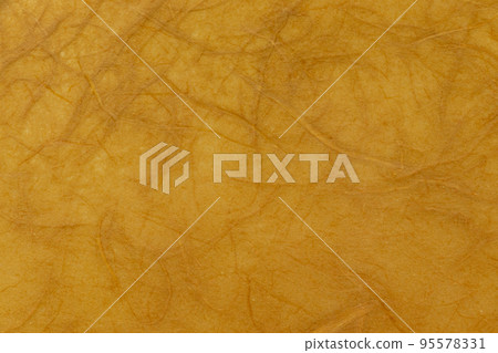 Brown Japanese paper with fibers protruding from the surface Brown Japanese paper with fibers protruding from the surface 95578331