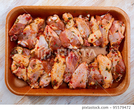 Fresh raw chicken meat marinated before frying shish kebab 95579472